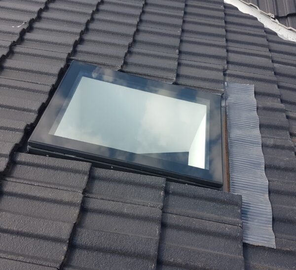 Skylight on a tiled roof.