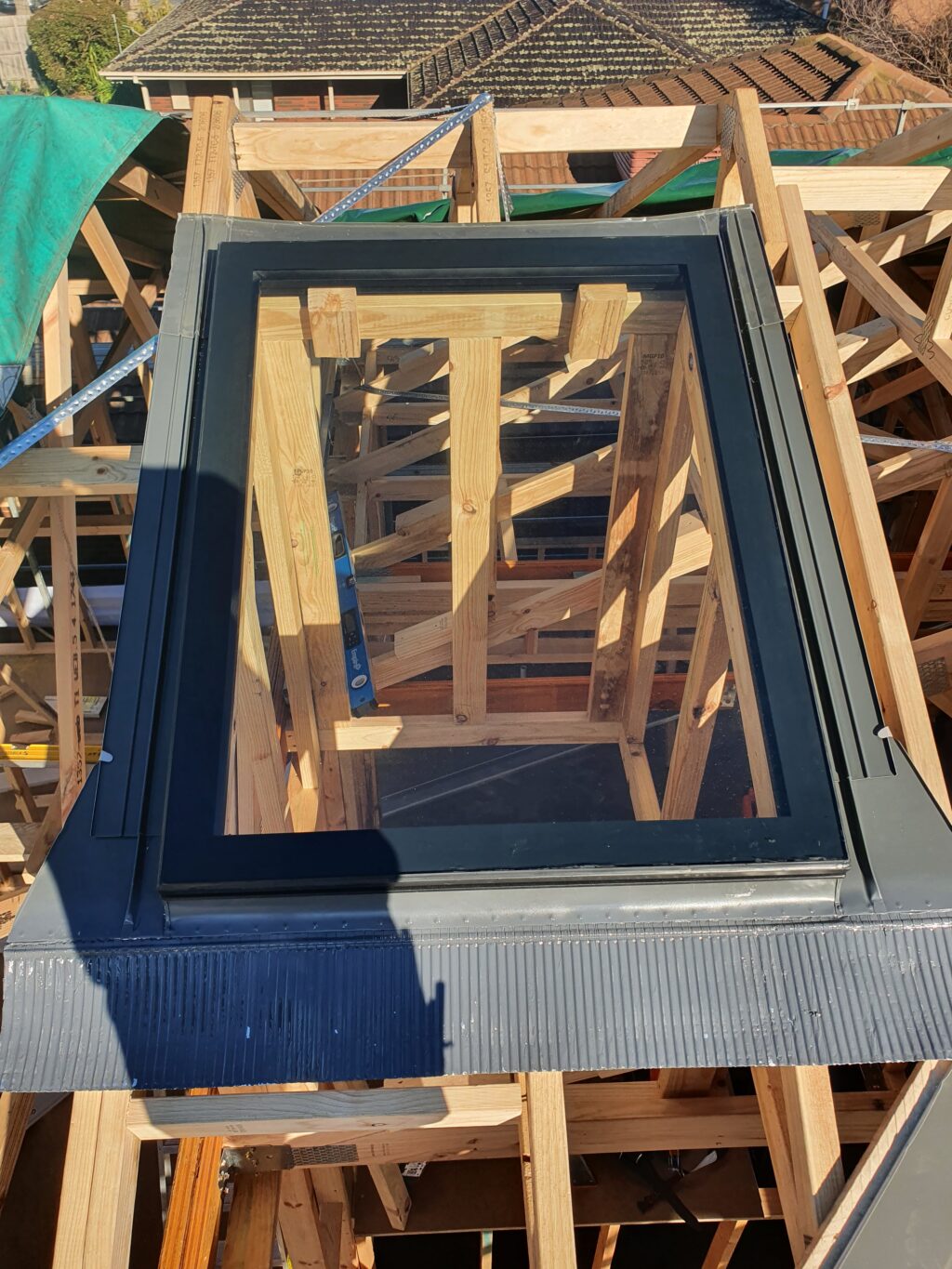 Skylight under construction and roof flashing