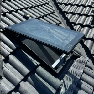 Operable skylight on tiled roof