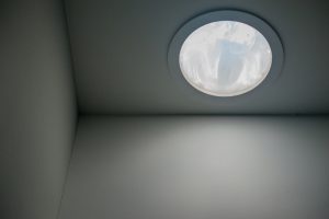 Round skylight in a ceiling.